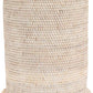 The Dalton Bath Collection by Pigeon & Poodle features a cylindrical woven basket, handcrafted from rattan in a natural beige finish, with a subtly flared base and meticulous detailing.