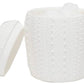 An open white porcelain container from the Hilo Bath Collection by Pigeon & Poodle displays cotton balls inside, featuring a textured sea urchin pattern that reflects coastal elegance.