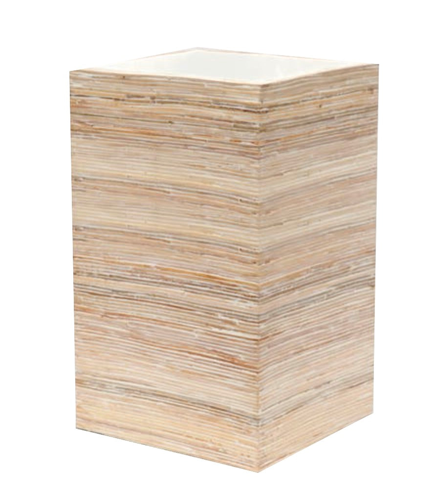 A rectangular, layered wooden block from Pigeon & Poodle’s Kona Bath Collection, featuring a light wood grain pattern, displayed against a white background.
