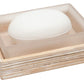 A white bar of soap rests in a frosted dish atop a striped wooden tray from the Pigeon & Poodle Kona Bath Collection, capturing the relaxed elegance of island life.