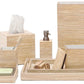 Bring a touch of island life to your bathroom with the Pigeon & Poodle Kona Bath Collection. Crafted from light wood and rattan, this set features a tissue box cover, soap dispenser, toothbrush holder, soap dish, tray, and waste bin.