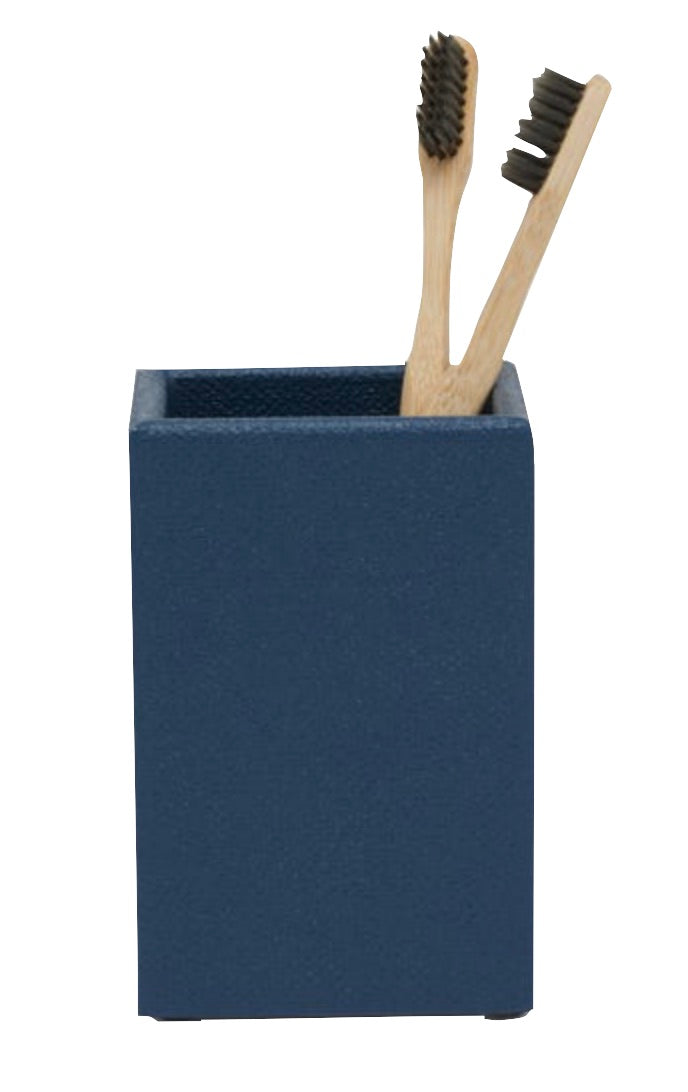 The Dannes Bath Collection by Pigeon & Poodle features a monochrome blue square toothbrush holder with two bamboo toothbrushes—an elegant bathroom essential.