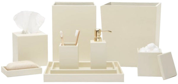 The Pigeon & Poodle Dannes Bath Collection, ideal for a modern bathroom, includes tissue, soap, toothbrush holders, cotton ball container, and a soap pump. The faux waxed Belgian linen finish adds sophistication to these essential accessories.