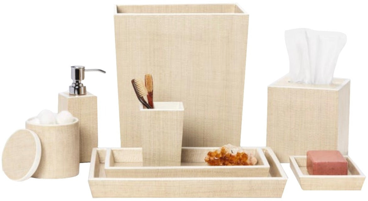 From Pigeon & Poodle's Maranello Bath Collection, this beige set includes painted wood accents, a waste bin, tissue box cover, soap dispenser, tumbler with combs, lidded jar, tray with decorative stone, and a soap dish with bar soap.