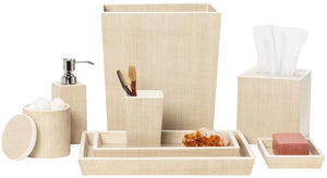 From Pigeon & Poodle's Maranello Bath Collection, this beige set includes painted wood accents, a waste bin, tissue box cover, soap dispenser, tumbler with combs, lidded jar, tray with decorative stone, and a soap dish with bar soap.