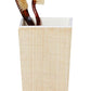 Two brown toothbrushes sit in a rectangular beige holder from the Pigeon & Poodle Maranello Bath Collection, crafted with abaca-resin, set against a white background.