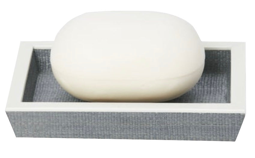A white soap bar rests on a rectangular gray Maranello Bath Collection dish by Pigeon & Poodle, featuring a white rim and durable abaca-resin construction for lasting style.
