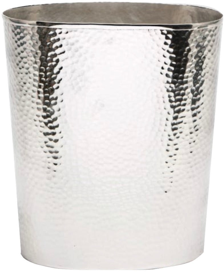 The Verum Bath Collection by Pigeon & Poodle features a cylindrical, silver metal bath container with a hand-hammered texture and smooth rim—an elegant touch for your bathroom.