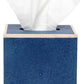 The Manchester Bath Collection by Pigeon & Poodle features a blue shagreen-textured tissue box with a single white tissue emerging from the top.