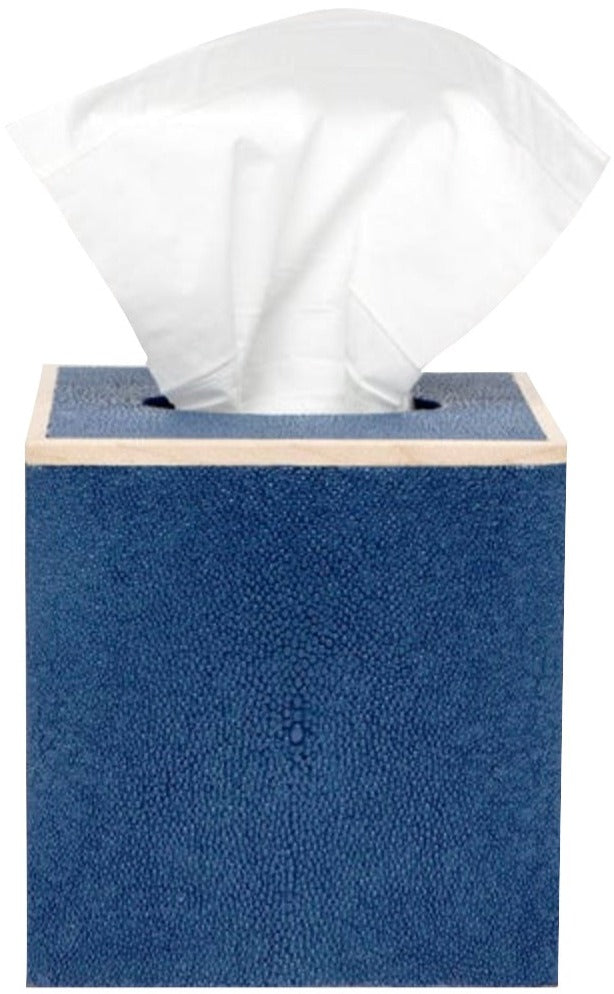 The Manchester Bath Collection by Pigeon & Poodle features a blue shagreen-textured tissue box with a single white tissue emerging from the top.