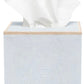 The Manchester Bath Collection tissue box by Pigeon & Poodle features elegant veneer trim and a white tissue protruding from the top for a refined look.
