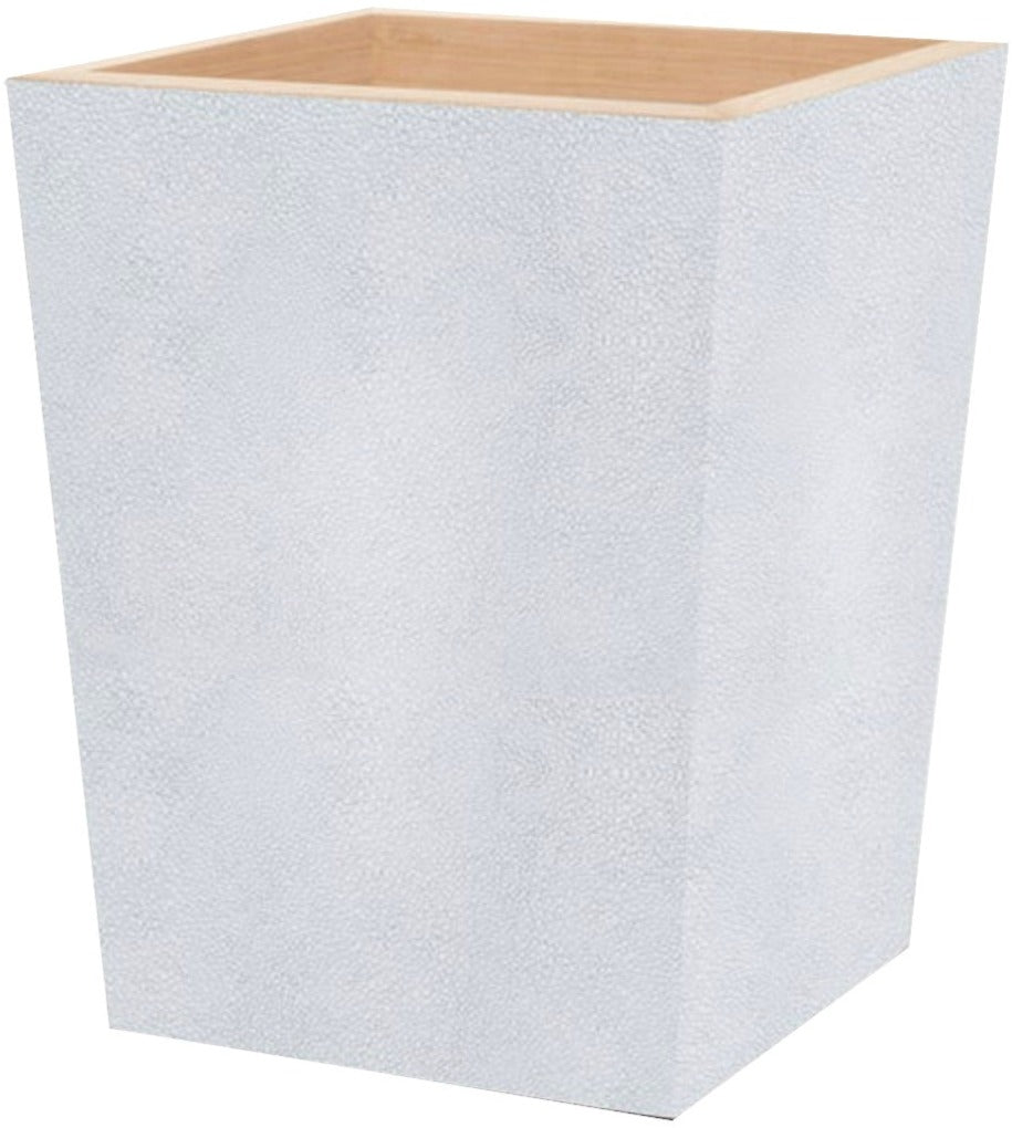 The Manchester Bath Collection by Pigeon & Poodle features a square, light gray wastebasket with a textured shagreen exterior and wood-toned veneer interior trim.