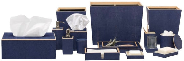 A set of Pigeon & Poodle Manchester Collection bathroom accessories with gold accents and shagreen veneer trim, including a tissue box cover, soap dispenser, and various trays and containers.