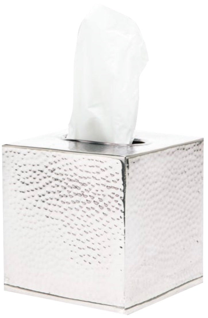 The Verum Bath Collection by Pigeon & Poodle features a hand-hammered silver tissue box with a textured finish and crisp white tissue visible at the top.