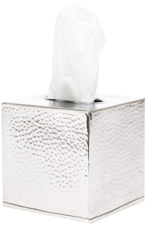 The Verum Bath Collection by Pigeon & Poodle features a hand-hammered silver tissue box with a textured finish and crisp white tissue visible at the top.