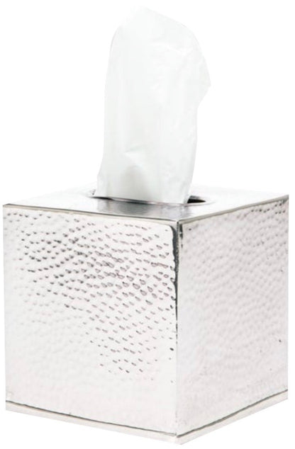 The Verum Bath Collection by Pigeon & Poodle features a hand-hammered silver tissue box with a textured finish and crisp white tissue visible at the top.