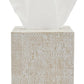 The Ghent Bath Collection beige woven grass tissue box by Pigeon & Poodle, featuring a white tissue peeking out from the top, adds seaside-chic style to your space.