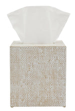 The Ghent Bath Collection beige woven grass tissue box by Pigeon & Poodle, featuring a white tissue peeking out from the top, adds seaside-chic style to your space.