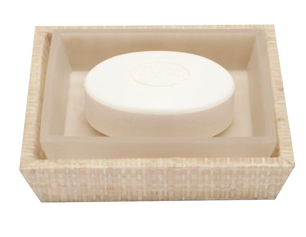The Ghent Bath Collection by Pigeon & Poodle features a rectangular woven grass soap dish with a matching tray, holding an oval bar of soap and bringing seaside-chic charm to your bath.