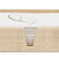A rectangular woven grass box by Pigeon & Poodle holds white napkins with a gold design—an elegant accent from the Ghent Bath Collection, perfect for bringing seaside-chic style to your bathroom.