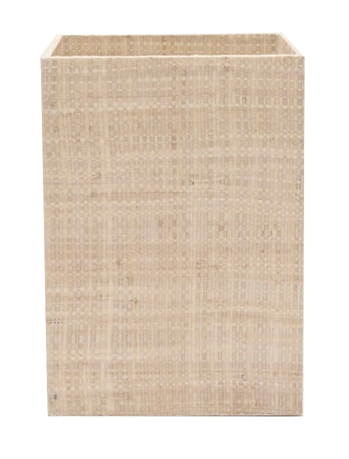 The Ghent Bath Collection basket by Pigeon & Poodle features a rectangular, beige woven grass design with an open top, adding seaside-chic style. Shown against a plain white background.