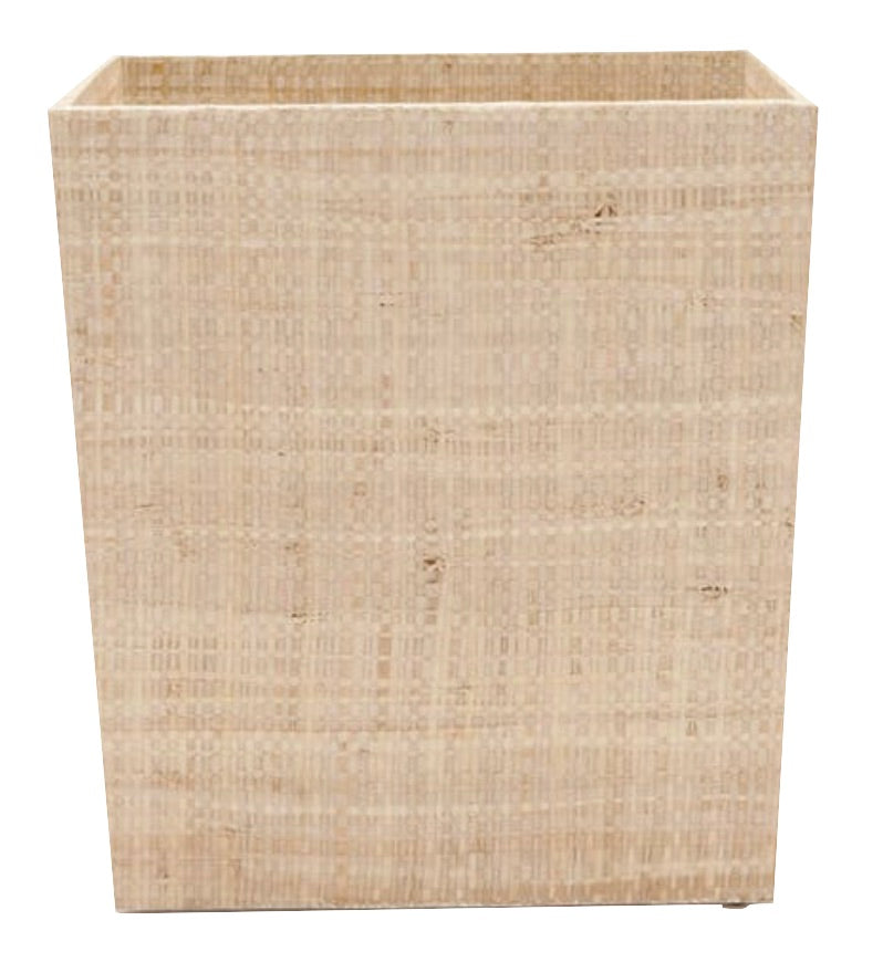 The Pigeon & Poodle Ghent Bath Collection features a square, beige woven basket crafted from natural fibers, adding a textured elegance to any bath decor against a white background.