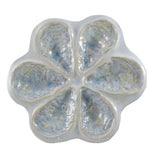 The Oyster Platter Collection by AE Ceramics features a glossy light blue and white ceramic platter with six petal-shaped sections in a flower pattern—ideal for serving oysters Rockefeller or oysters on the half shell.