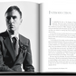 A black and white image shows an open book with a photo of a man in a suit on the left page and text beginning with "Introduction" on the right. Perfect for fashion enthusiasts, this piece introduces the world of haute couture, reminiscent of Assouline's Dior by Raf Simons 2012 - 2015 elegant designs.