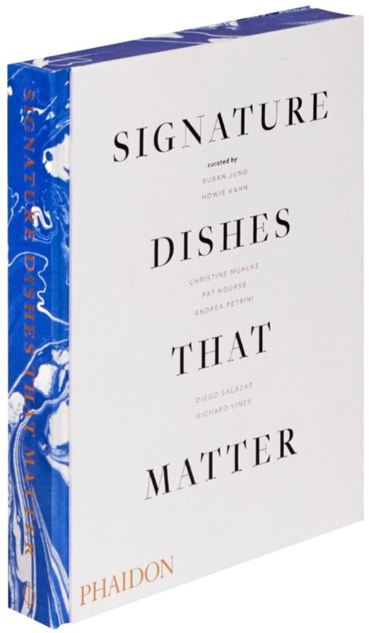 The image displays Phaidon's "Signature Dishes That Matter," featuring a marbled blue and white spine, exploring iconic recipes and dining's cultural history.
