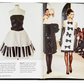 An open Little Book of Chanel displaying photographs of two different dresses from a Coco Chanel fashion collection, with descriptive text alongside the images.
