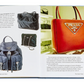 An open Little Book of Prada displaying various luxury Prada handbags from different years, showcasing the fashion house's evolution in design and fashion by Graphic Image.