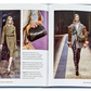 An open Little Book of Prada displaying two pages, each featuring a model wearing designer outfits from Graphic Image's autumn/winter collections, with text annotations highlighting the design elements and year of the collections.