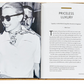 An open copy of the "Little Book of Gucci" by Graphic Image displays a black and white photo of a smiling person in sunglasses beside a page that outlines Gucci's prestigious contributions to Italian luxury fashion.