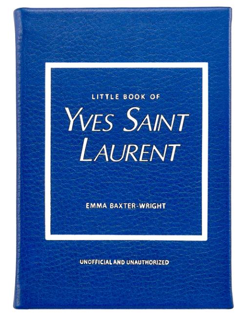 The book "Little Book of Yves Saint Laurent" by Emma Baxter-Wright, offered by Graphic Image, features a blue cover with an elegant white border and text, encapsulating the essence of the legendary haute couture fashion house.