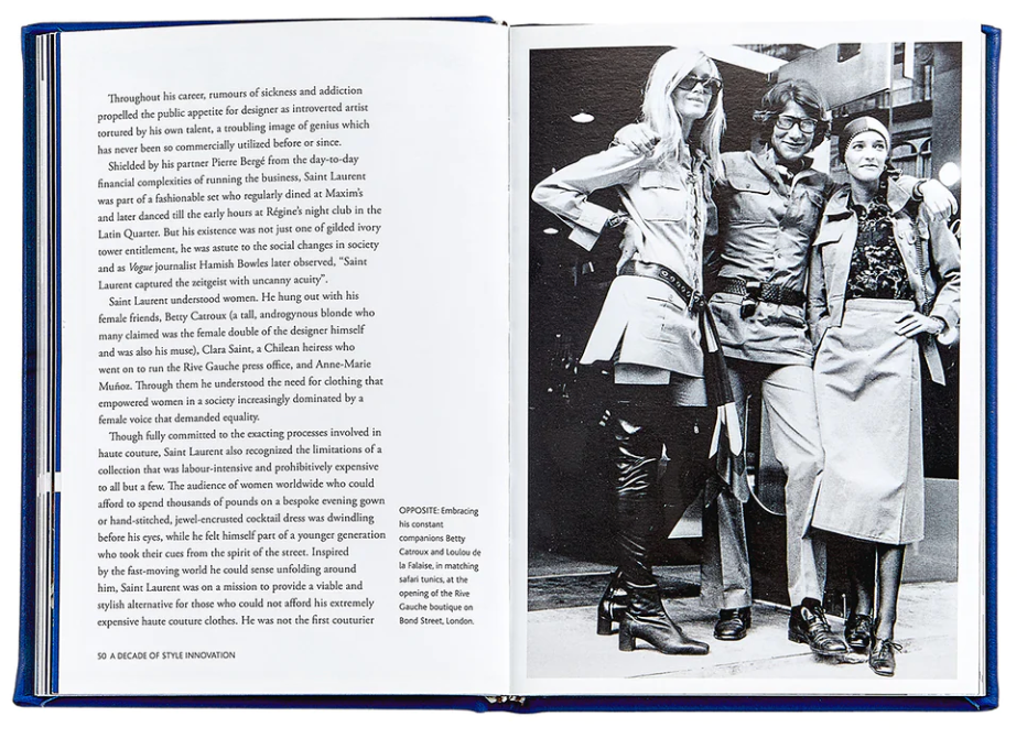 The "Little Book of Yves Saint Laurent" by Graphic Image features an open book with text on the left and a black-and-white photo on the right, depicting three individuals in stylish outfits from a renowned fashion house, embodying Yves Saint Laurent's timeless elegance.