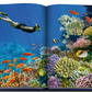 An open book showcasing the wonders of underwater exploration in the marine habitat, Assouline's Ocean Wanderlust.