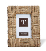 The Sea Grass Frame Collection by Two's Company features a rectangular braided frame crafted from woven wicker and sea grass rope, with a blank display area for your images and sizing details.