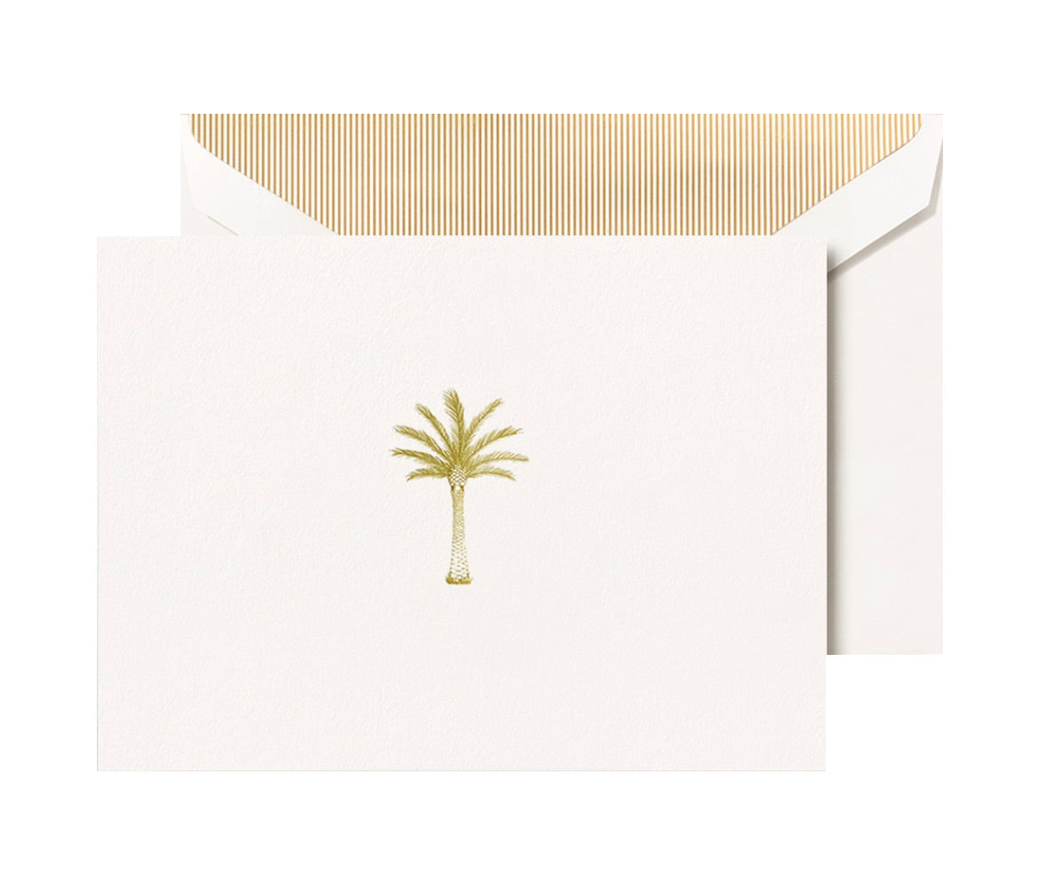 The Crane Palm Tree Classic Card Set, crafted on all-cotton paper, features a gold-embossed palm tree and includes matching white envelopes lined with gold stripes.