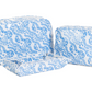 The Luxe Gloss All Heart Blue Travel Set by TRVL Design includes three blue and white floral pouches—one shown open with divided compartments—making it a stylish, organized wash bag trio for travel.