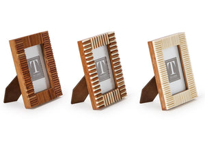 The Stacks Mini Frame Collection by Two's Company features three handcrafted mango wood mini photo frames with textured borders in brown, two-tone brown and white, and white, all displayed upright on a white background.