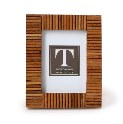 The Stacks Mini Frame Collection by Two's Company features a handcrafted Mango Wood photo frame with vertical grooves, a "T" insert placeholder, and 3x4 inch (7.5 x 10 cm) dimensions.