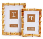 Two's Company Bamboo Natural Frame Collection features two empty, eco-friendly frames—one large, one small—displayed side by side on a white background, bringing timeless style to any space.