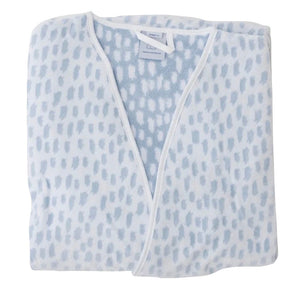 The Weezie Towels Short Plush Robe is a folded light blue and white terry bathrobe with a dotted pattern and white trim, displayed on a plain white background.
