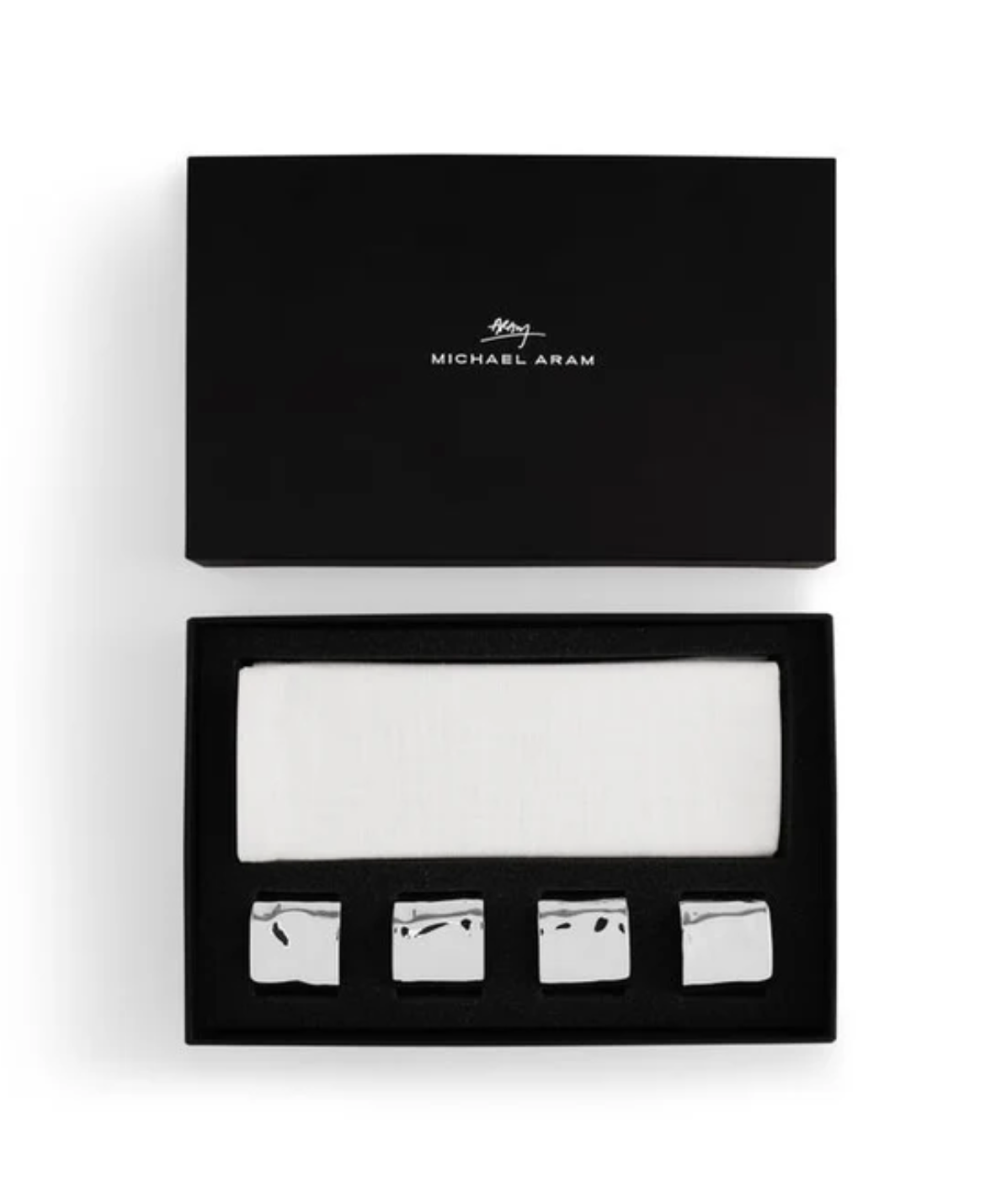Michael Aram Reflective Napkin and Napkin Ring Gift Set featuring four metallic napkin rings with an irregular, textured finish and a white cotton napkin in a gift box.