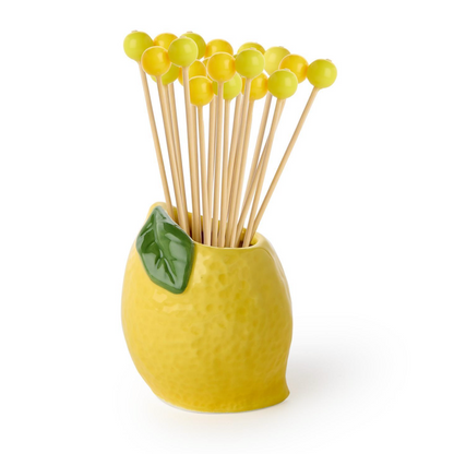 The Two's Company Lemon with Yellow Bead Cocktail Picks features reusable bamboo picks in a ceramic lemon holder, making it a perfect hostess gift.