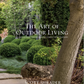 The book cover of “The Art of Outdoor Living” by Rizzoli features a beautifully landscaped garden scene with manicured bushes, lush greenery, mature trees, and elegant stone steps—an inspiring coffee table book ideal for anyone passionate about garden design and outdoor entertaining.