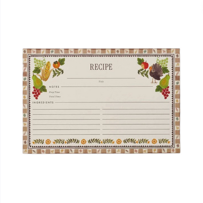 The Harvest Recipe Cards by Rifle Paper Co. feature charming illustrations of vegetables and fruit bordering a blank recipe card with spaces for the title, notes, prep and total time, and ingredients—perfect for saving your favorite Thanksgiving recipes.