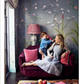 A woman and a young child sit on a velvet sofa against a wall decorated with de Gournay: Hand-Painted Interiors chinoiserie wallpaper.