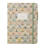 The Estee Collection hardcover journal by Rifle Paper Co. features floral patterns, an elastic band closure, and a "Journal" label—perfect for writing and journaling.