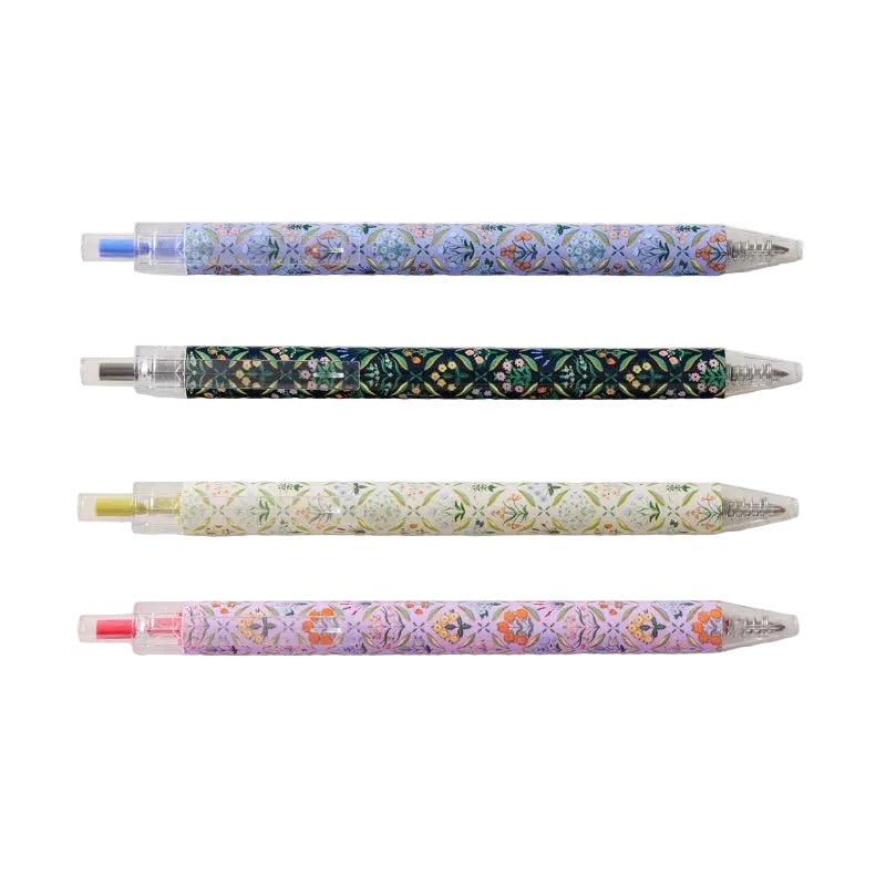 Four mechanical pencils from the Estee Collection by Rifle Paper Co., featuring floral patterns and geometric designs, are arranged horizontally on a white background—perfect for writing or journaling.